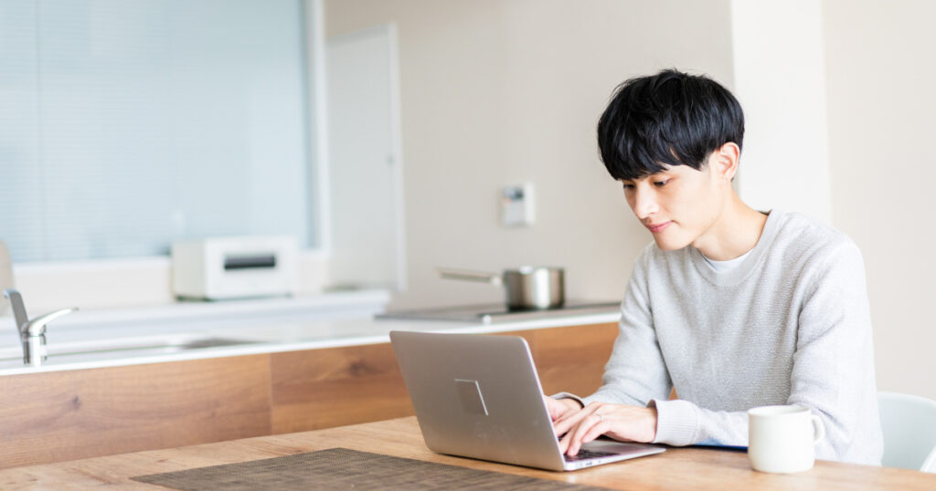 man operating a computer